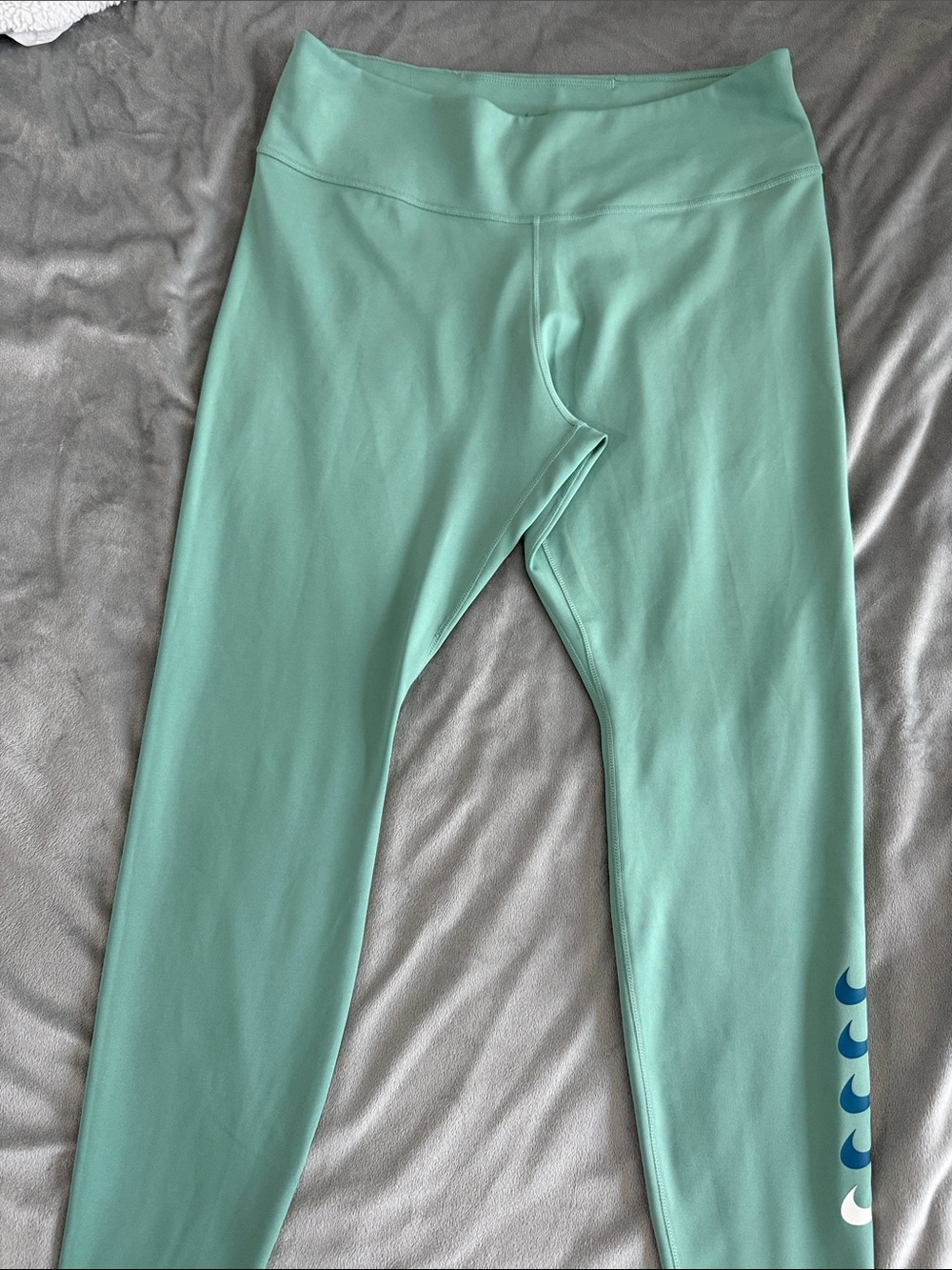 Nike Mint Green Leggings with Blue Swoosh Accents
